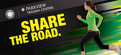 Share the Road graphic with runner
